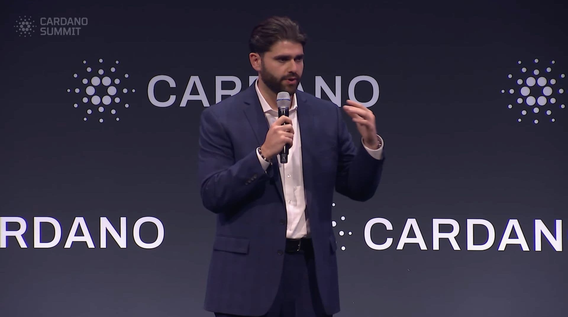 Draper Dragon's Partner Samiz Bayan speaking at Cardano Summit 2025